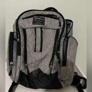 Backpack or diaper bag by Eddie Bauer.  Color is gray and black.